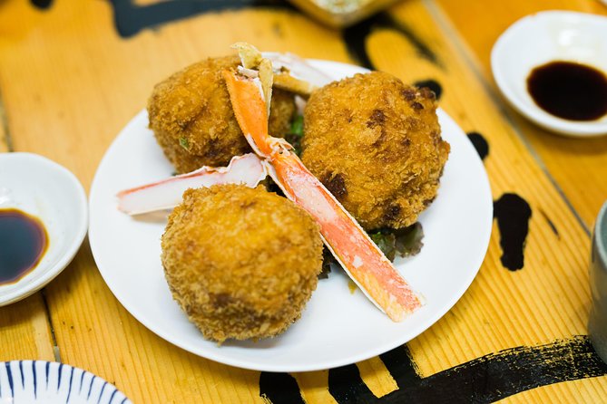 Best of Shinjuku: Izakaya Food Tour (4 Stops, 14+ Tastings) - Starting in Nishishinjuku with nearly two hours of food
