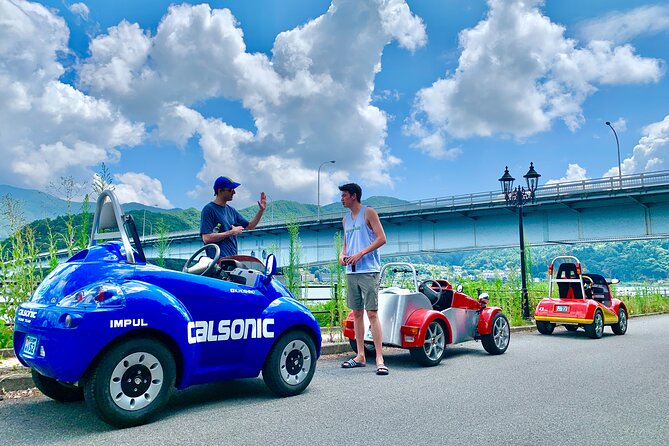 Cute & Fun E-Car tour following guide around Lake Kawaguchiko - Meeting at Kawaguchiko Station at 10:00