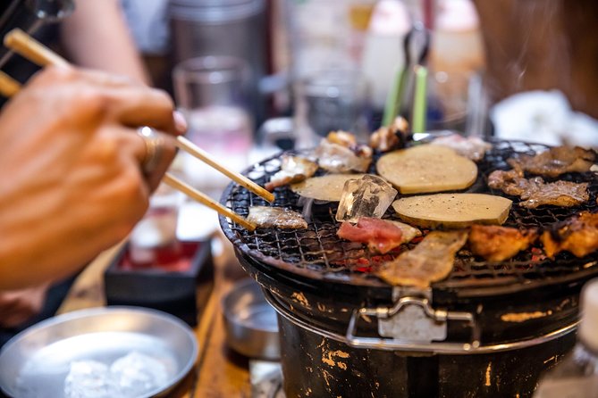 Eat Like a Local in Tokyo – Private & Personalized Food Tour - Yakitori and retro backstreets