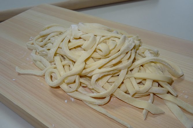 Experience all of Japanese culture and Japanese food experience classes "origami, udon, Japanese food, green tea, calligraphy" in 4 hours - Preparing Sushi, Gyoza, and Tempura