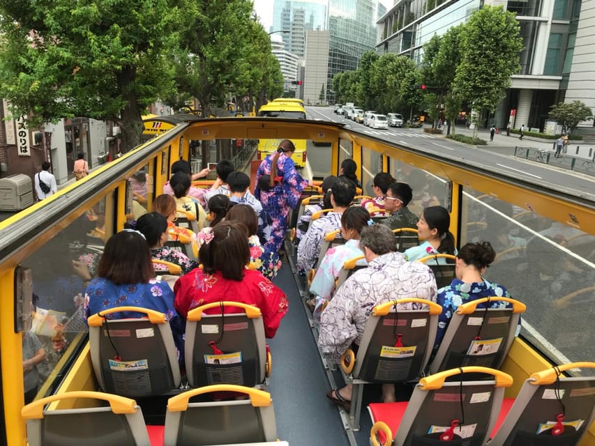 Tokyo: 60min Panoramic Open Top Bus Tour with Audio Guide - Odaiba and Toyosu from a moving bus