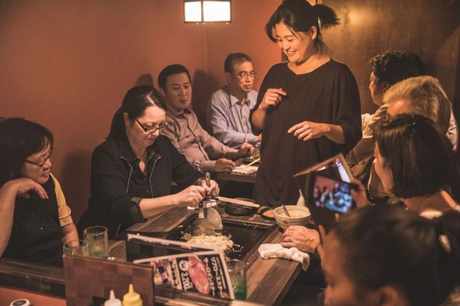 Tokyo After 5: Authentic Japanese Food & Drink Night Tour - Tsukishima Monja Street and the hotplate lesson