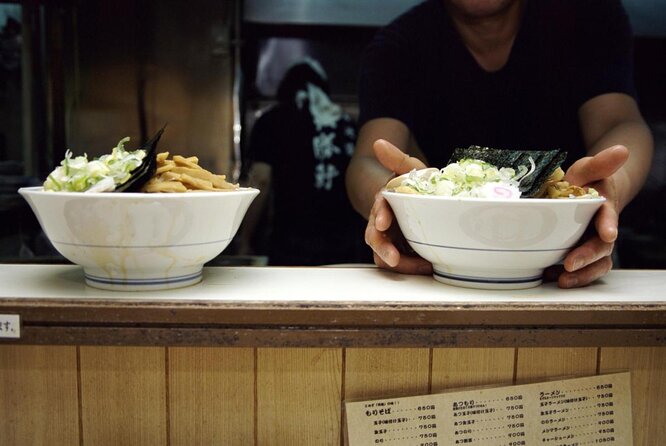 Tokyo Bar Hopping Tour in Shinjuku (All-You-Can-Drink + Dinner) - Kabukicho brings a louder, more energetic izakaya