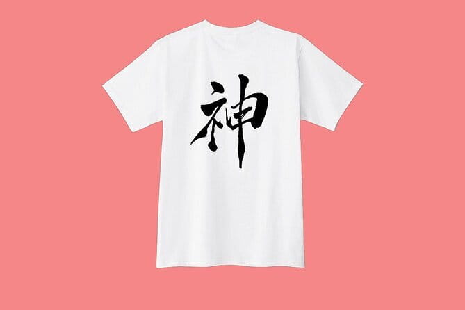 Tokyo: Calligraphy Workshop & Original T-Shirt Creation - Changing into workwear and preparing the ink