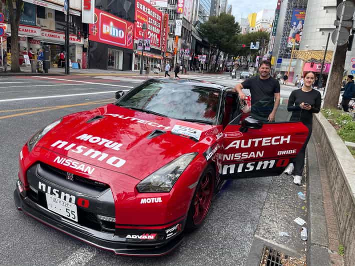 Tokyo: Daikoku Self-Drive R35 GT-R Custom Car Experience - Shibuya Crossing, seen from behind the wheel
