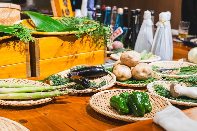 Tokyo Ginza Authentic Food Tour (Izakaya Hopping by local guide) - Stop one: seafood and sake around Yurakucho