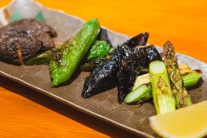 Tokyo Ginza Authentic Food Tour (Izakaya Hopping by local guide) - Group size, guide style, and what makes Ryo useful