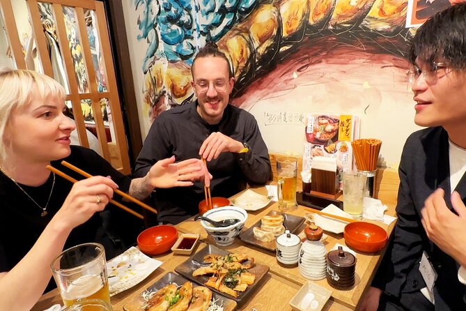 Tokyo: Shinjuku Bar Hopping & Night Walking Tour - Omoide Yokocho: red lanterns and tiny counters