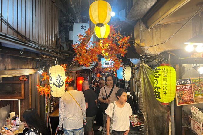 Tokyo: Shinjuku Food Tour (13 Dishes at 4 Local Eateries) - Omoide Yokocho: Tokyo’s narrow food lanes