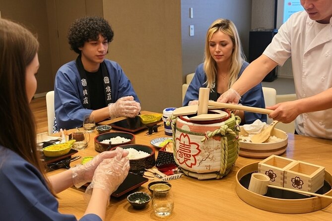 Tokyo Sushi Making Class : Sake Ceremony & Matcha Experience - Starting with kagami-biraki and a shared toast