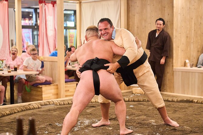 TokyoSumoShow, ChickenHotPot, and Mochi-Pounding by Pro Wrestlers - Mochi pounding is the gentlest hands-on activity